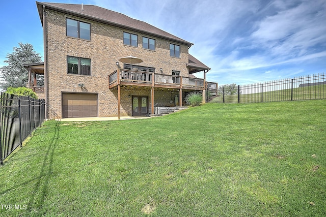 133 Christopher Way, Blountville, TN 37617 - rear view of house featuring an attached garage, brick siding, a deck, and driveway