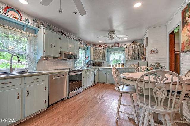 24483 Cave Creek Rd, Abingdon, VA 24211 - kitchen featuring a ceiling fan, stainless steel appliances, a sink, backsplash, and recessed lighting
