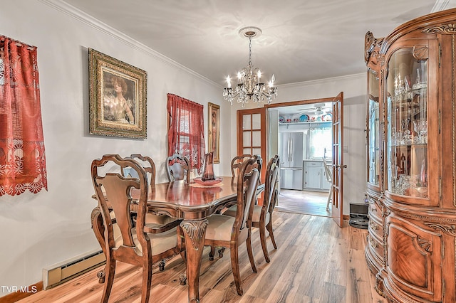 24483 Cave Creek Rd, Abingdon, VA 24211 - dining room featuring baseboard heating, a chandelier, light wood-type flooring, and ornamental molding