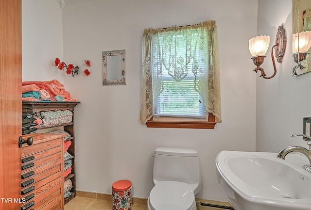 24483 Cave Creek Rd, Abingdon, VA 24211 - bathroom with a sink, a baseboard radiator, toilet, and tile patterned flooring