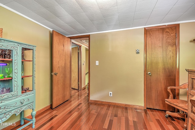 24483 Cave Creek Rd, Abingdon, VA 24211 - unfurnished room with wood finished floors, crown molding, and baseboards