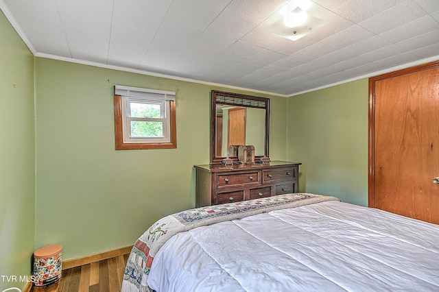 24483 Cave Creek Rd, Abingdon, VA 24211 - bedroom featuring wood finished floors, baseboards, and crown molding