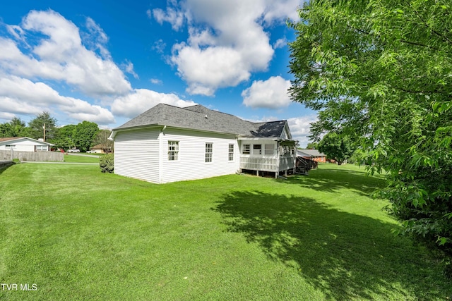 4006 Navaho Dr, Johnson City, TN 37604 - rear view of house with a lawn, a shingled roof, and a wooden deck