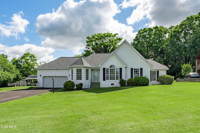 4006 Navaho Dr, Johnson City, TN 37604 - view of front of home with asphalt driveway, a garage, a front lawn, and roof with shingles