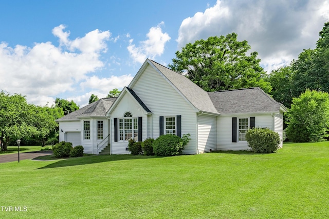4006 Navaho Dr, Johnson City, TN 37604 - view of front of property featuring a garage, a front lawn, and roof with shingles