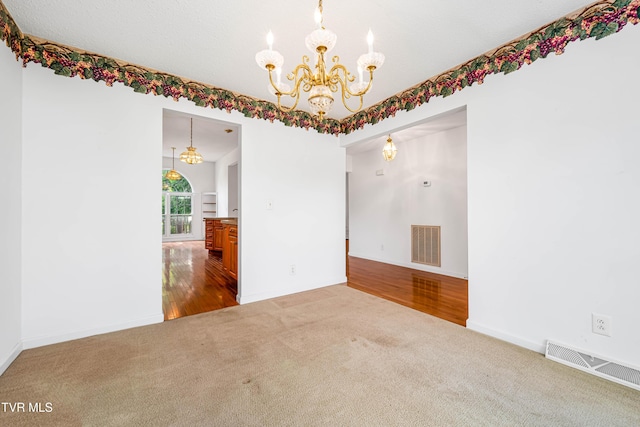 4006 Navaho Dr, Johnson City, TN 37604 - unfurnished room with a chandelier, carpet flooring, and baseboards