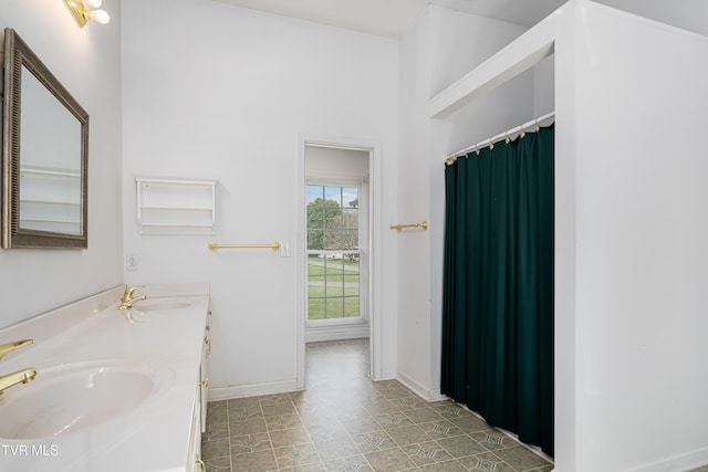 4006 Navaho Dr, Johnson City, TN 37604 - full bath featuring double vanity and baseboards