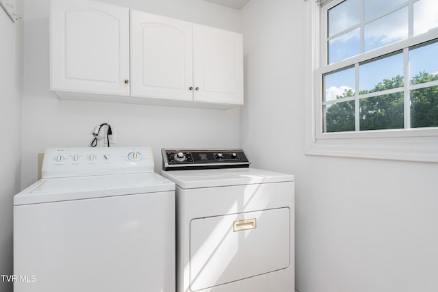 4006 Navaho Dr, Johnson City, TN 37604 - washroom with cabinet space and washing machine and dryer