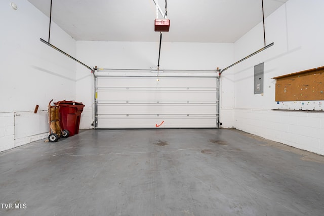4006 Navaho Dr, Johnson City, TN 37604 - garage with electric panel and a garage door opener