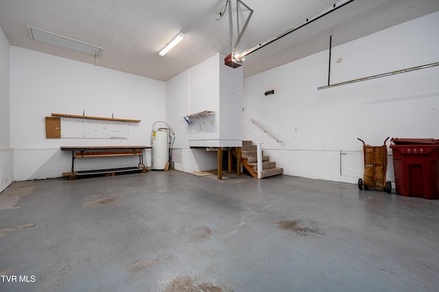 4006 Navaho Dr, Johnson City, TN 37604 - garage featuring water heater, a garage door opener, and a workshop area