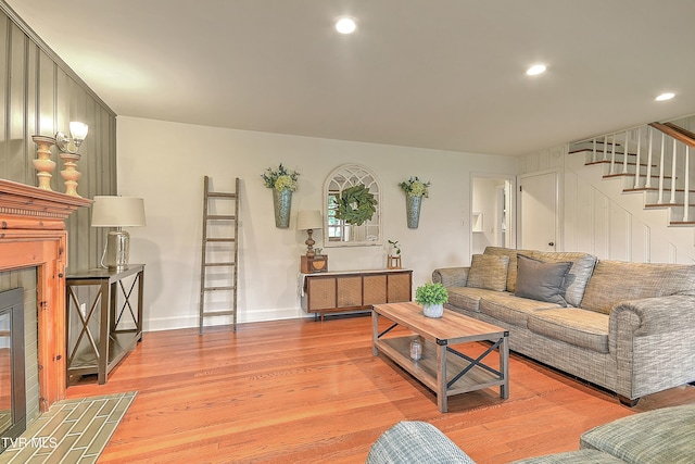 1449 Warpath Dr, Kingsport, TN 37664 - living room featuring light wood-style floors, stairs, recessed lighting, and baseboards