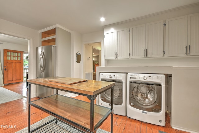 1449 Warpath Dr, Kingsport, TN 37664 - washroom featuring washing machine and clothes dryer, light wood-style floors, and recessed lighting