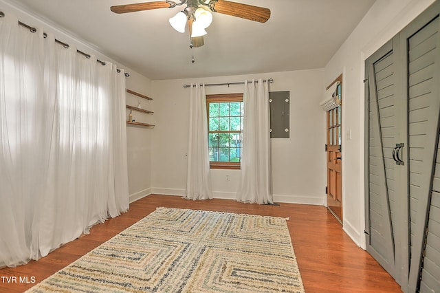 1449 Warpath Dr, Kingsport, TN 37664 - unfurnished room featuring ceiling fan, wood finished floors, electric panel, and baseboards