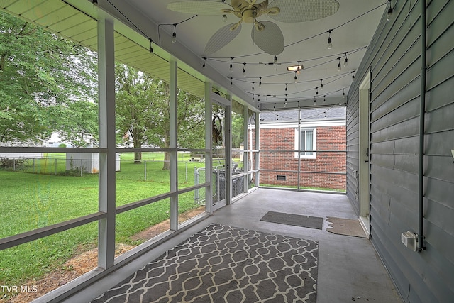 1449 Warpath Dr, Kingsport, TN 37664 - unfurnished sunroom featuring a ceiling fan and plenty of natural light