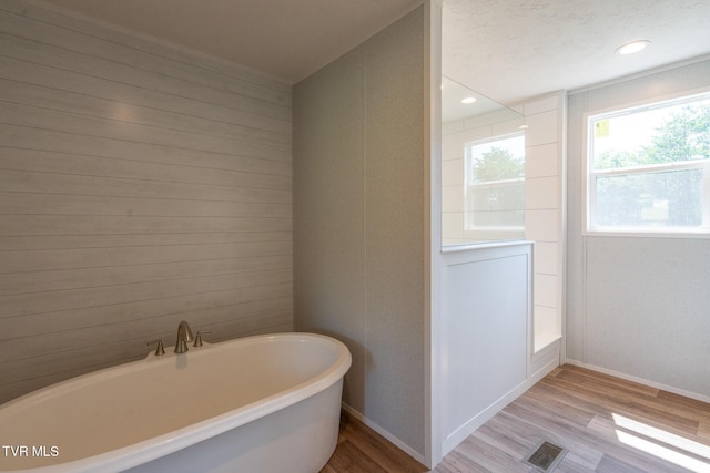255 Piney Grove Rd, Greeneville, TN 37743 - full bathroom featuring wood finished floors, a soaking tub, baseboards, and recessed lighting