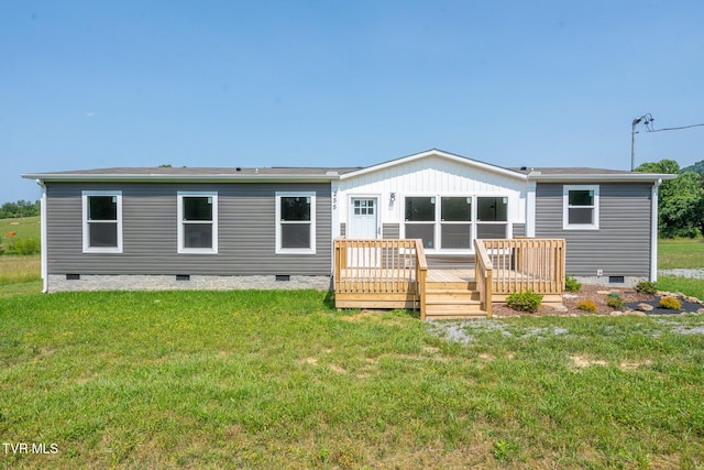 255 Piney Grove Rd, Greeneville, TN 37743 - back of property with crawl space, a wooden deck, and a yard