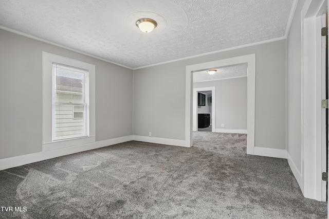 631 NE Meadow St, Coeburn, VA 24230 - spare room featuring a textured ceiling, carpet, crown molding, and baseboards
