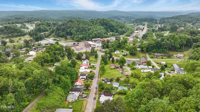 631 NE Meadow St, Coeburn, VA 24230 - view of property location featuring a forest, nearby suburban area, and a mountain backdrop