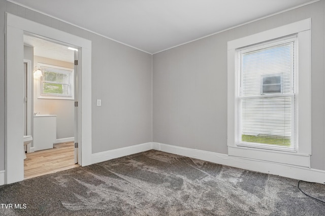 631 NE Meadow St, Coeburn, VA 24230 - carpeted spare room with ornamental molding and baseboards