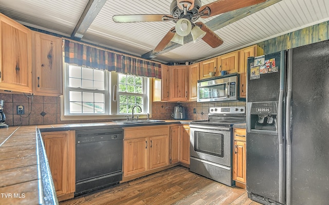 12350 Reedy Creek Rd, Bristol, VA 24202 - kitchen with black appliances, a sink, dark wood-type flooring, tile countertops, and tasteful backsplash