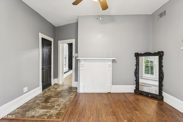 115 W Poplar St, Johnson City, TN 37604 - spare room with ceiling fan, baseboards, and wood finished floors