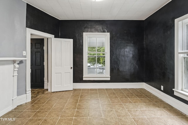 115 W Poplar St, Johnson City, TN 37604 - spare room featuring baseboards