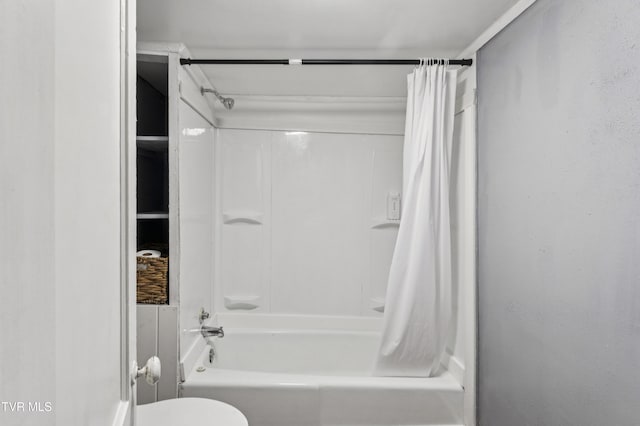 115 W Poplar St, Johnson City, TN 37604 - bathroom featuring shower / tub combo with curtain and toilet