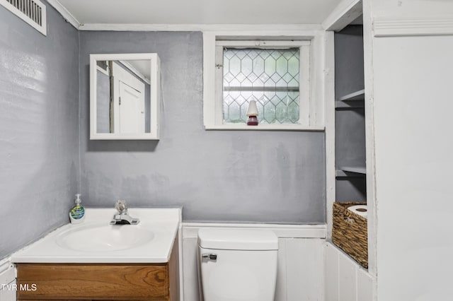 115 W Poplar St, Johnson City, TN 37604 - half bathroom featuring vanity and toilet