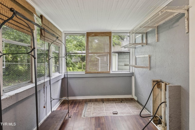 115 W Poplar St, Johnson City, TN 37604 - unfurnished sunroom with hardwood / wood-style flooring, baseboards, and wood ceiling