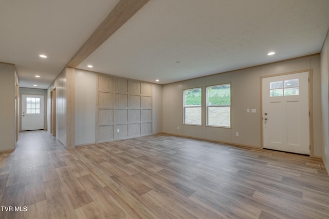 913 Henry Harr Rd, Blountville, TN 37617 - unfurnished living room with light wood finished floors, recessed lighting, and baseboards