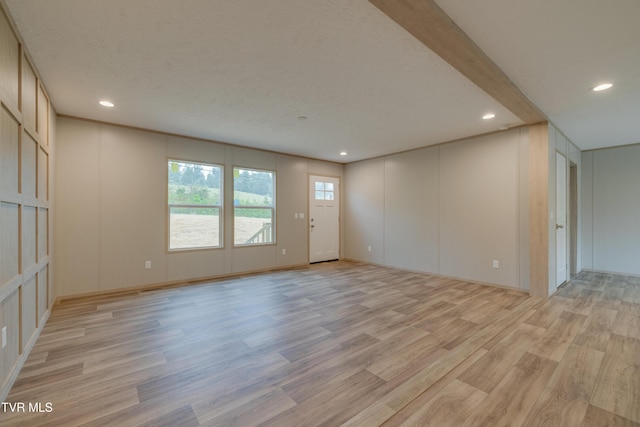 913 Henry Harr Rd, Blountville, TN 37617 - spare room with a decorative wall, light wood finished floors, and recessed lighting