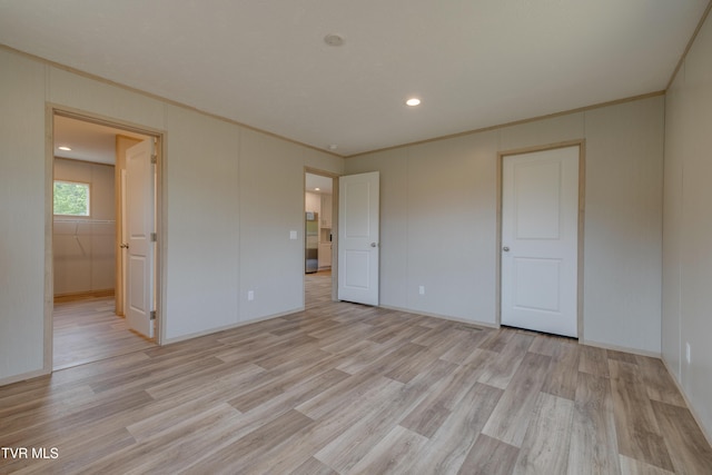 913 Henry Harr Rd, Blountville, TN 37617 - unfurnished bedroom with light wood finished floors, crown molding, recessed lighting, and baseboards