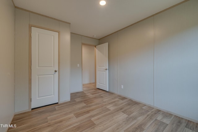 913 Henry Harr Rd, Blountville, TN 37617 - unfurnished bedroom featuring light wood-style flooring, ornamental molding, and baseboards