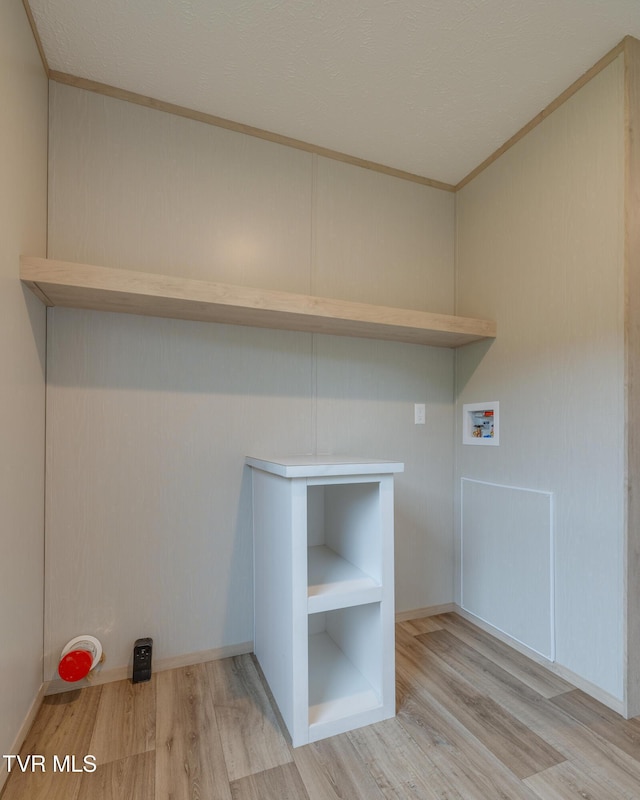 913 Henry Harr Rd, Blountville, TN 37617 - washroom with wood finished floors, washer hookup, and ornamental molding