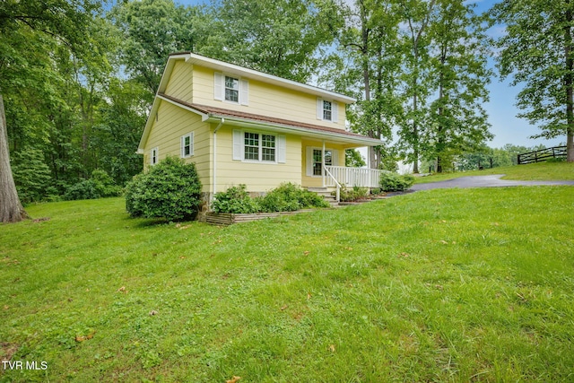 319 Woodland Rd, Jonesborough, TN 37659 - view of front of property featuring a porch and a front yard