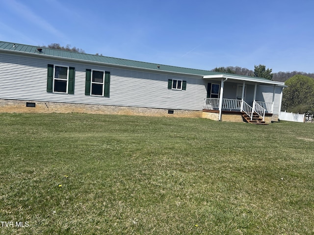 8 Circling Dr, Chuckey, TN 37641 - rear view of house with crawl space, a porch, a lawn, and metal roof