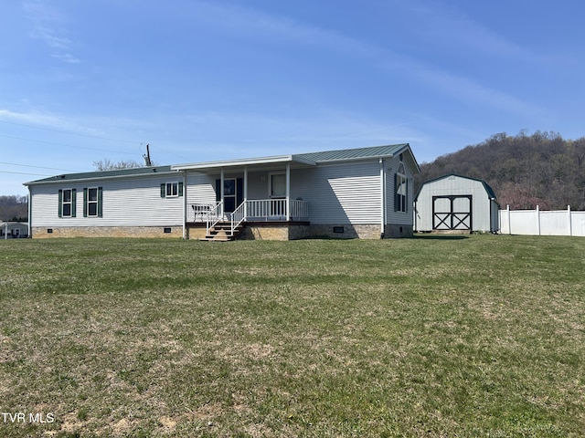 8 Circling Dr, Chuckey, TN 37641 - back of house with crawl space, a porch, and metal roof