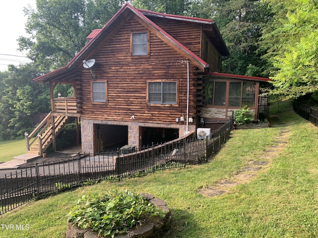 209 Brystone Dr, Gray, TN 37615 - view of side of home featuring log siding, stairs, and a sunroom