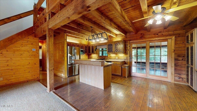 209 Brystone Dr, Gray, TN 37615 - kitchen with stainless steel appliances, wood walls, wooden ceiling with exposed beams, ceiling fan, and dark wood-style floors