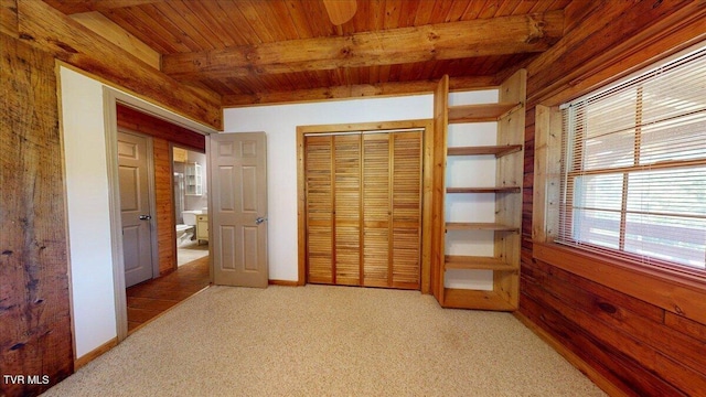 209 Brystone Dr, Gray, TN 37615 - unfurnished bedroom with wood ceiling with exposed beams, light colored carpet, a closet, and baseboards