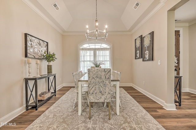 302 Charlton Ct, Bluff City, TN 37618 - dining space with a chandelier, dark wood-style flooring, a tray ceiling, ornamental molding, and baseboards