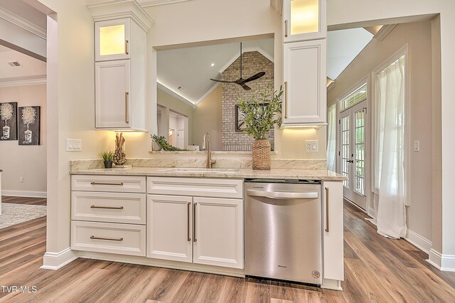 302 Charlton Ct, Bluff City, TN 37618 - kitchen featuring stainless steel dishwasher, a sink, lofted ceiling, ornamental molding, and baseboards