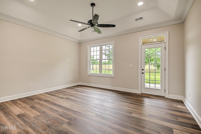 302 Charlton Ct, Bluff City, TN 37618 - empty room featuring dark wood-style flooring, a ceiling fan, recessed lighting, baseboards, and a tray ceiling