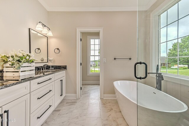 302 Charlton Ct, Bluff City, TN 37618 - full bathroom featuring vanity, marble look tiles, a freestanding tub, baseboards, and crown molding