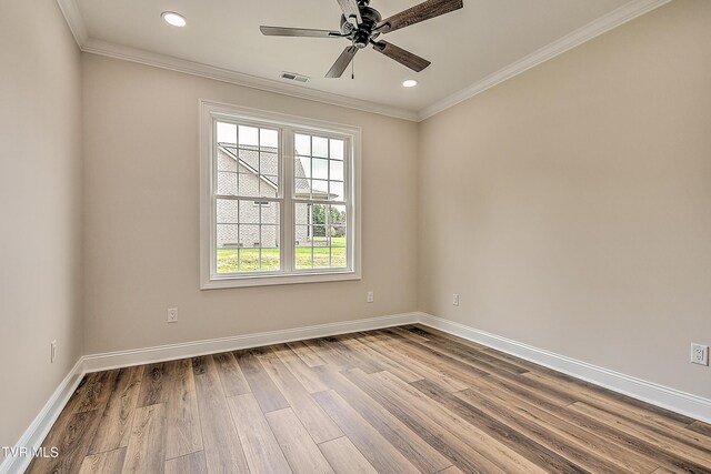 302 Charlton Ct, Bluff City, TN 37618 - empty room with wood finished floors, crown molding, a ceiling fan, baseboards, and recessed lighting