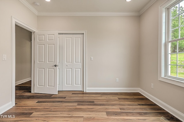 302 Charlton Ct, Bluff City, TN 37618 - unfurnished bedroom with ornamental molding, baseboards, a closet, wood finished floors, and recessed lighting