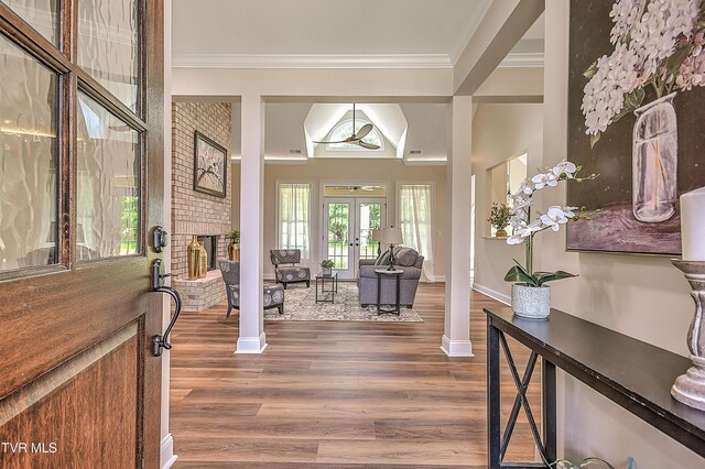 302 Charlton Ct, Bluff City, TN 37618 - entryway featuring ornamental molding, wood finished floors, french doors, a brick fireplace, and baseboards
