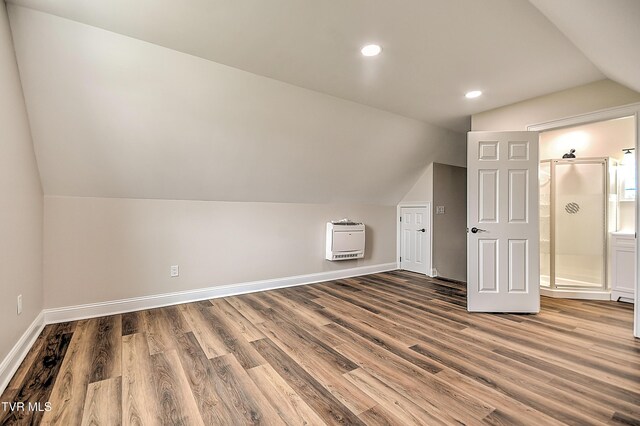 302 Charlton Ct, Bluff City, TN 37618 - additional living space with heating unit, lofted ceiling, wood finished floors, baseboards, and recessed lighting