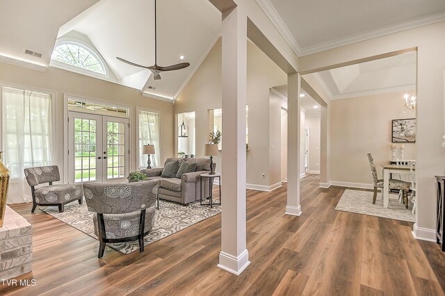 302 Charlton Ct, Bluff City, TN 37618 - living room with french doors, wood finished floors, baseboards, crown molding, and high vaulted ceiling
