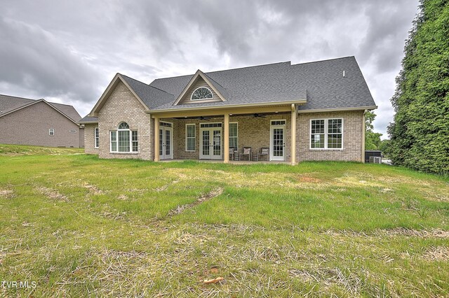 302 Charlton Ct, Bluff City, TN 37618 - back of house featuring french doors, ceiling fan, brick siding, a yard, and roof with shingles